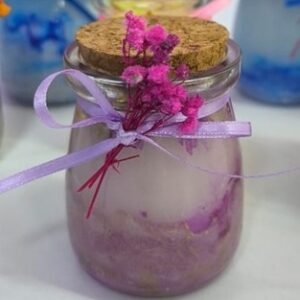 Vela marmolada en frasco de vidrio