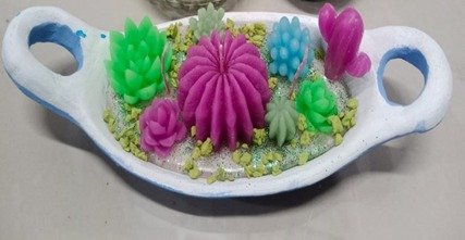 Vela terrario en maceta decorativa